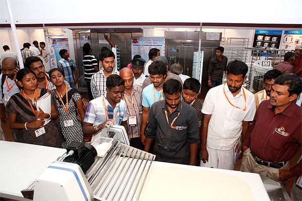 Crowd around the CHAMUNDE stand at Bakexpo