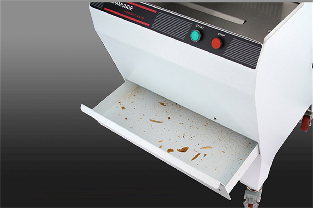 Crumb collecting drawer on the Handomat FS 410